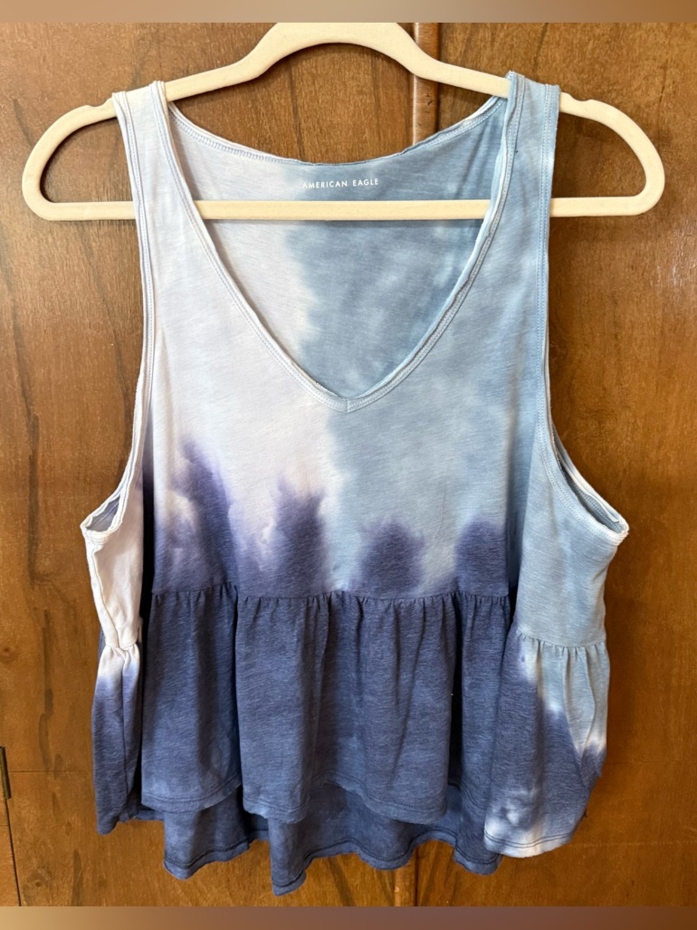 American Eagle tank top with peplum  raw edge hem Size M Blue Tie Dye